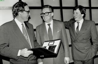 The lord knows: British financier Rupert Anthony Galliers-Pratt (middle) teamed up with Peter Gundy (left) and Lord Beaverbrook to form a new financial venture using their established resources on both sides of the Atlantic