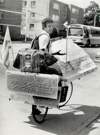 Poet pauses: Walter Gallaztegui stops for a breather in Toronto before pedaling on to Montreal, his destination in a cycling trip that has taken him through 15 countries from his home in Uruguay