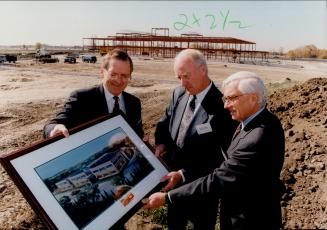 William Garriock (left) with other Sciex executives Jim Reynolds (centre) and wilf Lewitt