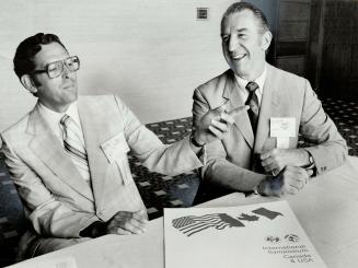 Marvin Goldberg, left, chatting with U.S. counterpart Ralph Weiger