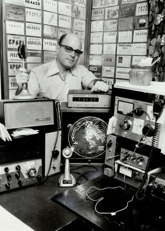 Ready to help: Scarborough ham radio operator Michael Goldstein stands in his basement, which is packed which is packed with radio equipment.