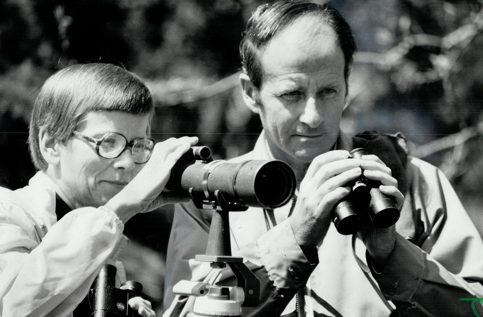 Practised eyes: Joy and Clive Goodwin, authors of A Bird-Watching Guide to Ontario, focus their telescope and binoculars so they won't miss any of the 1,000 plumages familiar to the Metro area