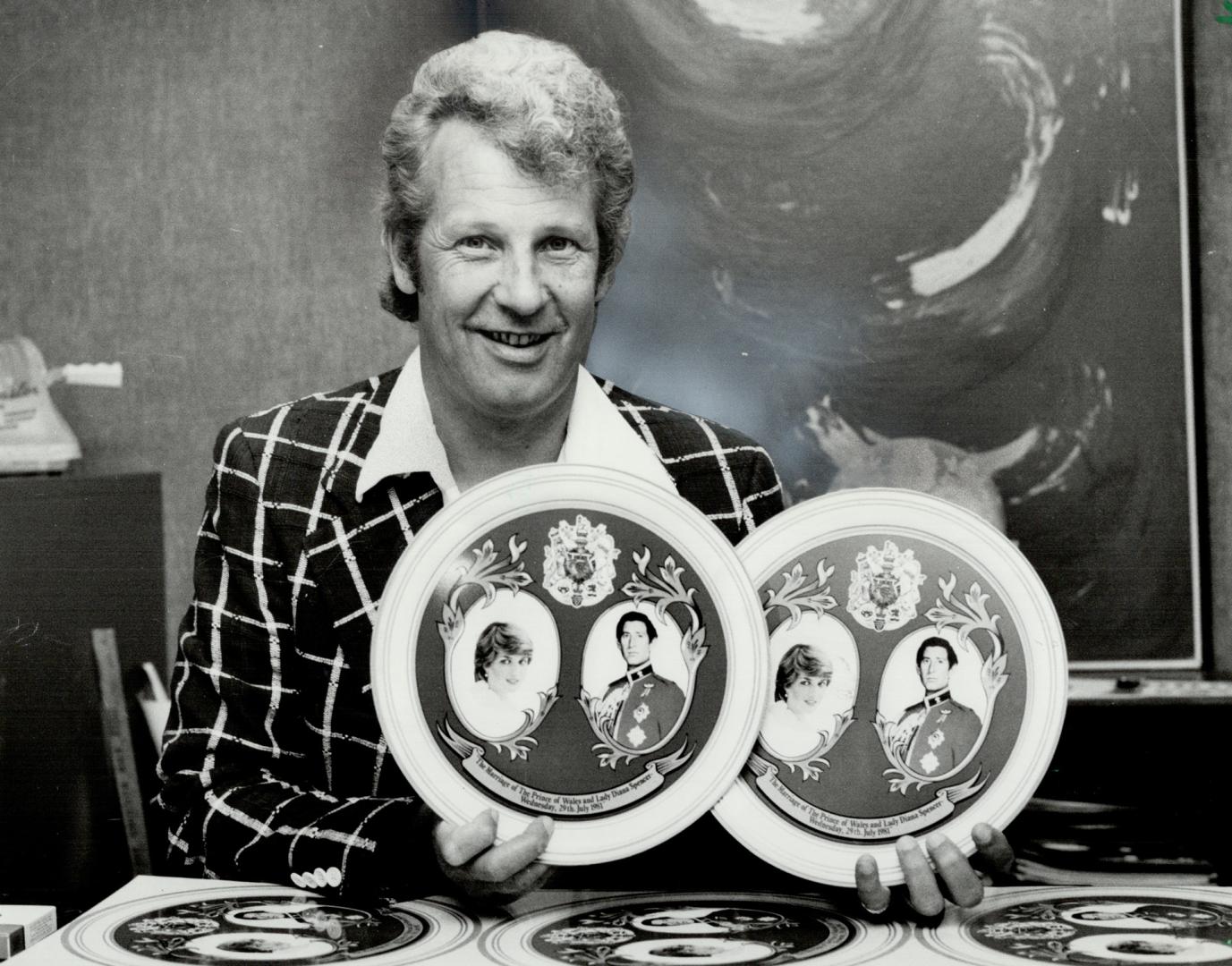 Made in Canada: Denis Griggs displays metal trays being produced by his new Pic-A-Promotion business in Markham