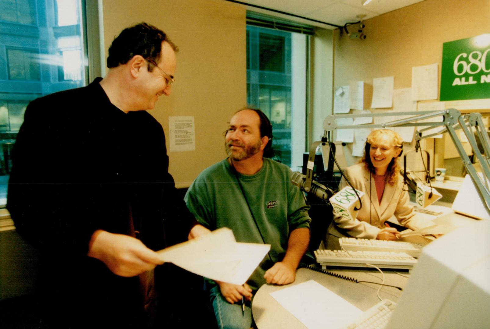 Brian Hill talks to Morlane Oliver and Joe Snider between Weather Forecasts