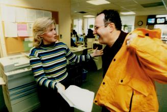 Stephanie Smyth, 680 New sanchar Woman and News reader on CHFI, gives Brian a hug.