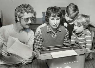 Still plugging: Pat Hutchins of Mississauga, helped by her husband, Fred, with overseers Jennifer, 7, and Jeffrey, 4, has been circulating petitions asking for government aid for those who bought their homes under the Assisted Home Ownership Program and who are facing interest increases of up to 8 per cent