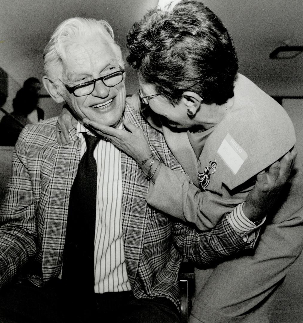 Norm Jones receives a hug from Muriel Fisher, a patient for 38 years, during a retirement party yesterday in Scarborough