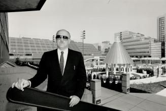 Vision realized: Designer Michael Kirkland is so proud of Mel Lastman Square that he and Ellis Galea christened the wedding pavilion last Sunday (that's the tepee-like structure) by being the first couple to be married there