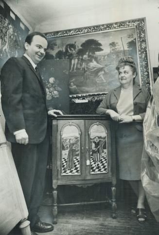 Hungarian-Born Paul and Marianna Kneffel work at restoring furniture and art in this little crowded studio on Avenue Rd. They came to Canada in 1960.