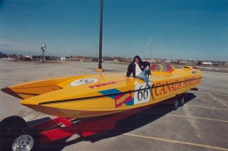 Lorne Lelbel, president of Canada Homes, sits atop his canada Homes Challenger at the International Centre.