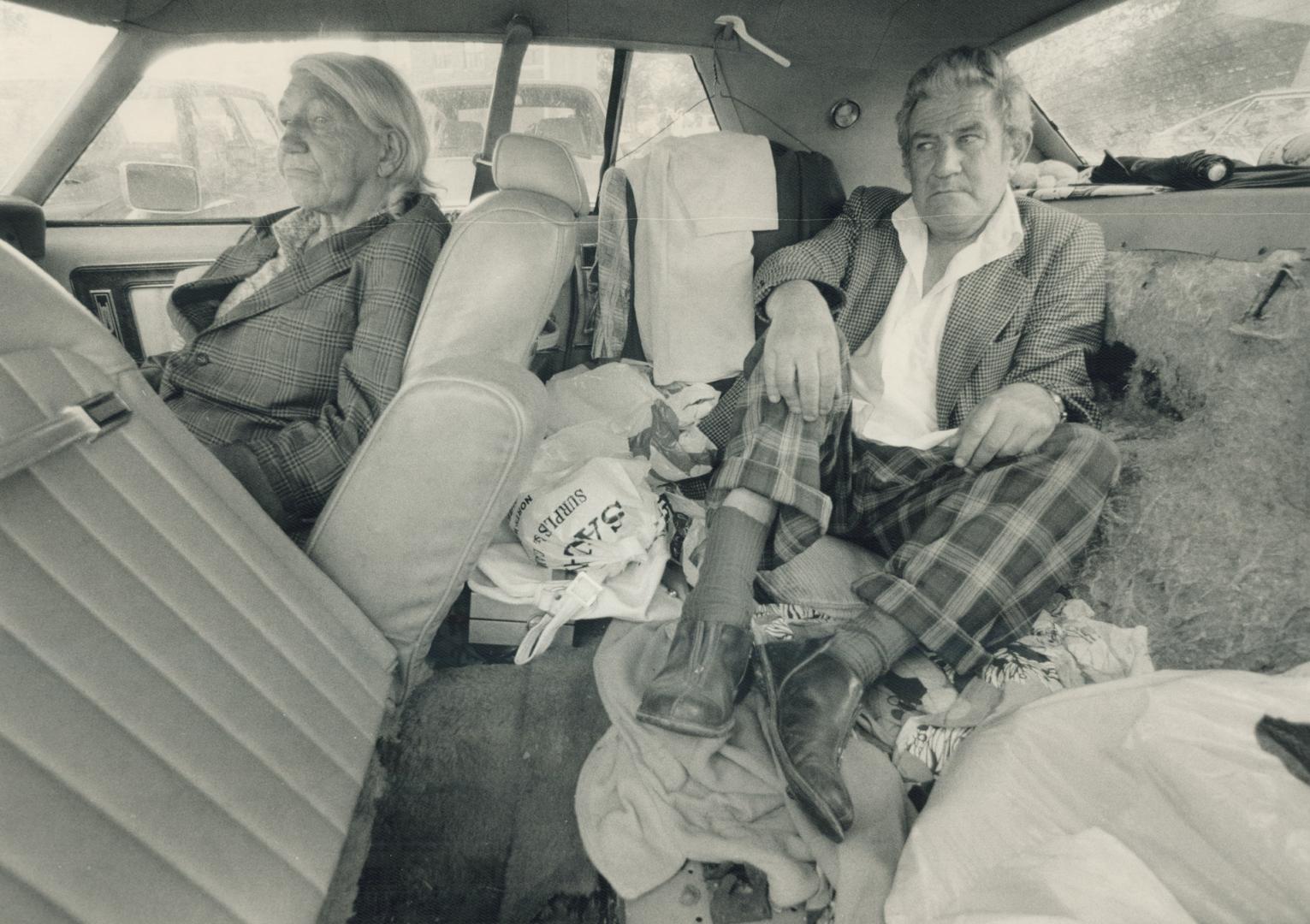 Home sweet home: Anna Pumper, 73, gets the front seat and Bobby Lincoln, 52, takes the back in the home they bought for $300, a 1976 Mercury Marquis with a flat tire