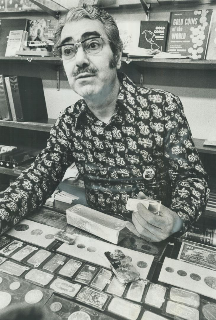 Bewildering Array of one-ounce precious-metal wafers is shown by Roy Longo at Arcade Coin and Stamp Shop