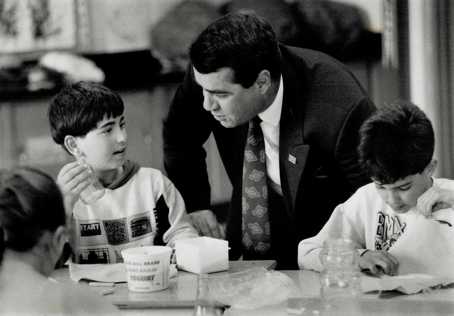 Tete-A-Tete: Andre Lalonde, director of th French board, chats with a student at Jeanne-Lajoie school. The three-year-old board has a staff of 40.