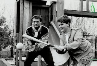 In good shape: Ivan Kulbisky relaxes with his son Patrick, 13, as he recovers from an experimental new form of treatment for leukemia currently being co-ordinated by Toronto Hospital