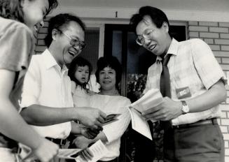 Tory hopeful: Scarborough North candidate Peter Lam, canvassing the Louie family8 yesterday, bases his candidacy on years of community and school-board work in east Metro