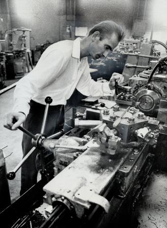 Laszlo Lengel at new job. He earns $1.65 an hour at lathe