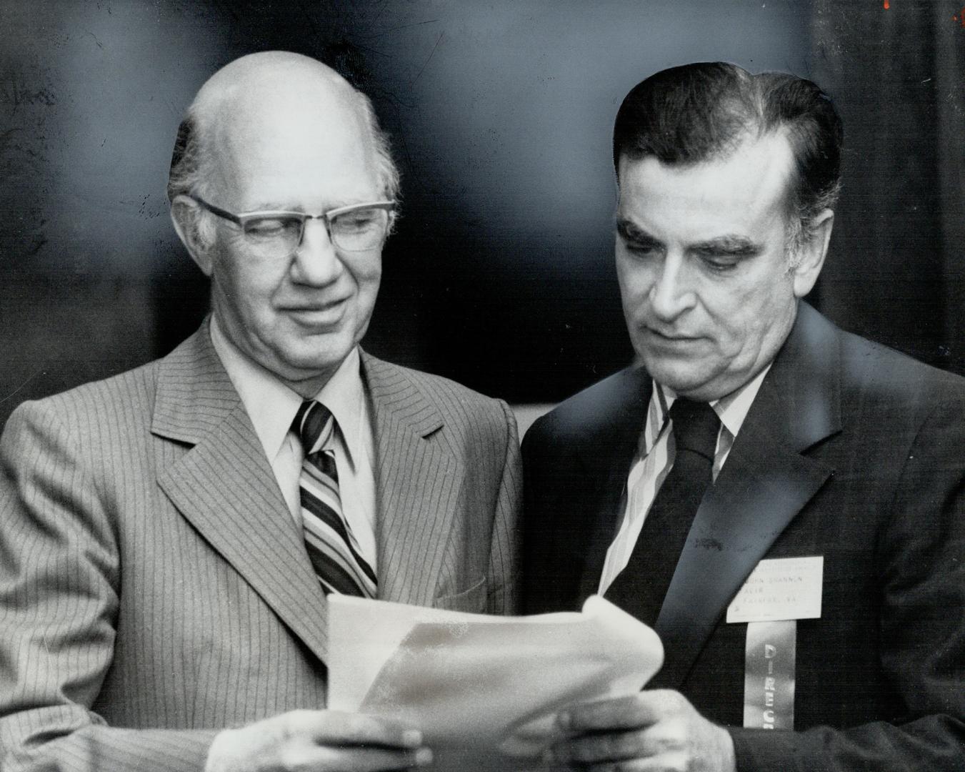 Douglas J. McClellan, left, is the first Canadian to be named president of the U.S.-dominated National Tax Association-Tax Institute of America which has 4,000 members. He is shown with John Shannon of Washington, D.C.