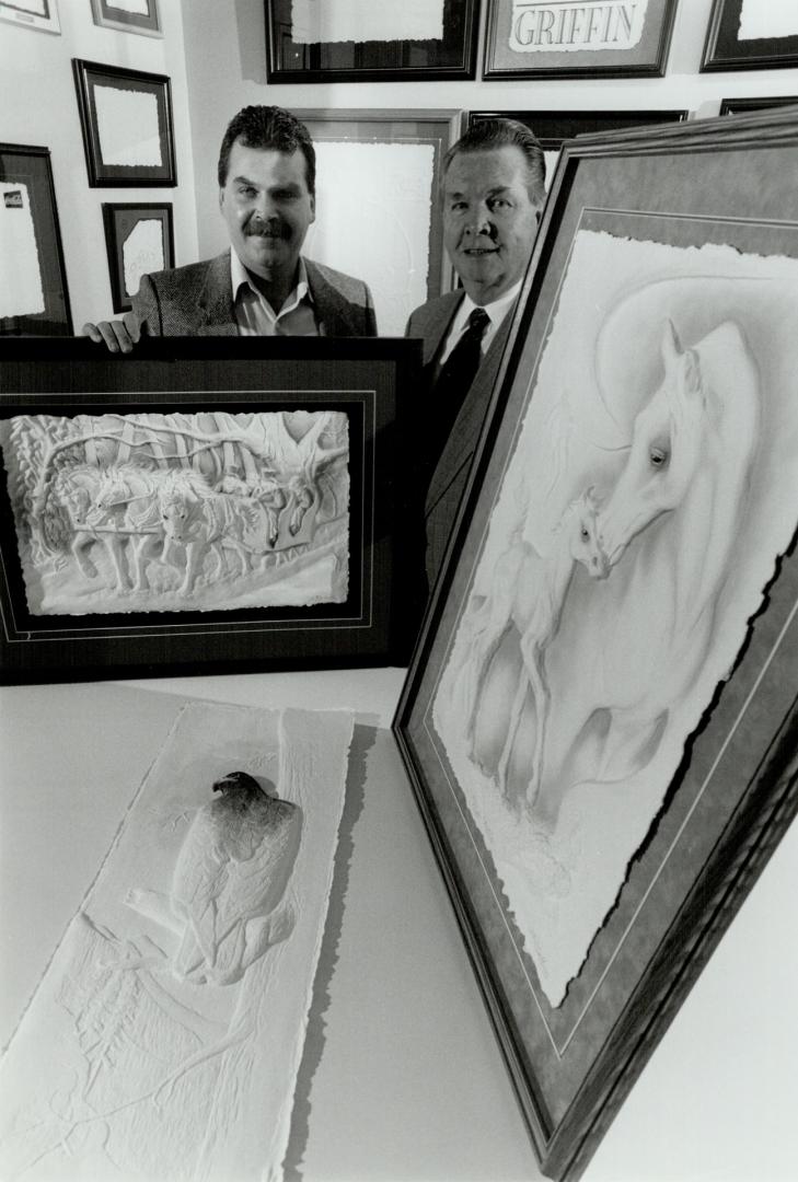 Cartoons next? Father and son Don and Greg McCrea make pictures from cast paper at their Richmond Hill location