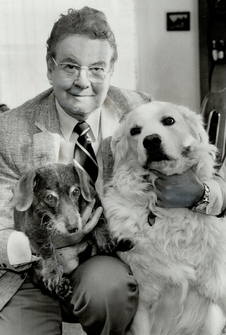 Old friends: Dan MacDonald, president of animal welfare group, is himself owner of two dogs, 17-year-old Whiskers and 13-year old Duchess