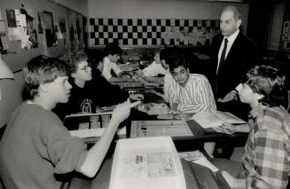 York Mills teacher John McElhiney with students Marco Gisheisner, Darren Phillison, Edward Chan, John Karrys, Jacques Poddar, Steve Xiropodis, Chris Mason