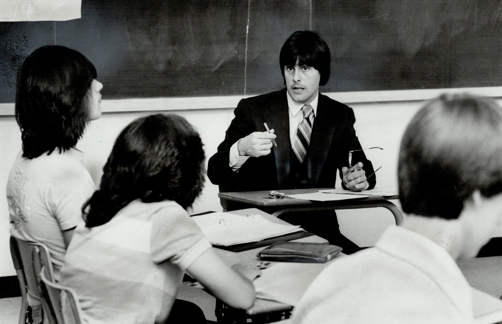 Harsh lesson: Teacher Garry Macey had to resort to stern measures to get some work out of three students in his Man in Society class and came close to kicking one of them out