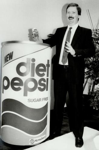 Battle: Coca-Cola Canada president Neville Kirchmann (left) and Pepsi marketing vice-president Ron McEachern (top)