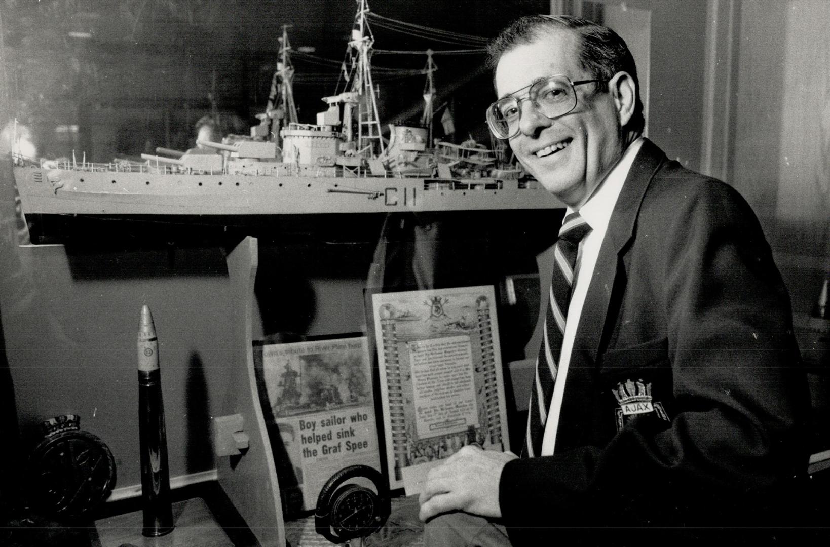 Historic name: Ajax Mayor Bill McLean shows the scale replica of H