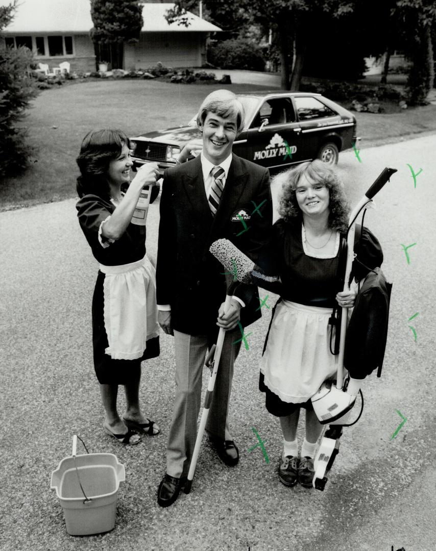 Mopping-up operation: Molly Maid president Jim MacKenzie spruces up with Jean Cloes and Anne Jervis