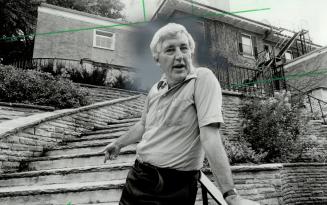 Stairway to past: David McQueen, professor of economics at York University, stands on a stone stairway at the back of Glendon Hall