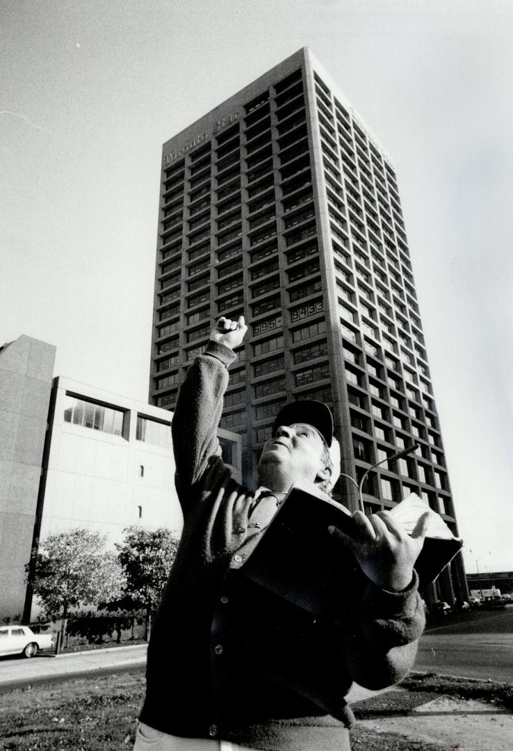 Birdman' calls: George V. Madrigal, a travelling American evangelist, whistles outside The Toronto star.