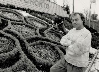 Idea blossoms: Gerry Mahoney, right, spearheaded floral advertising along the Gardiner Expressway embankment