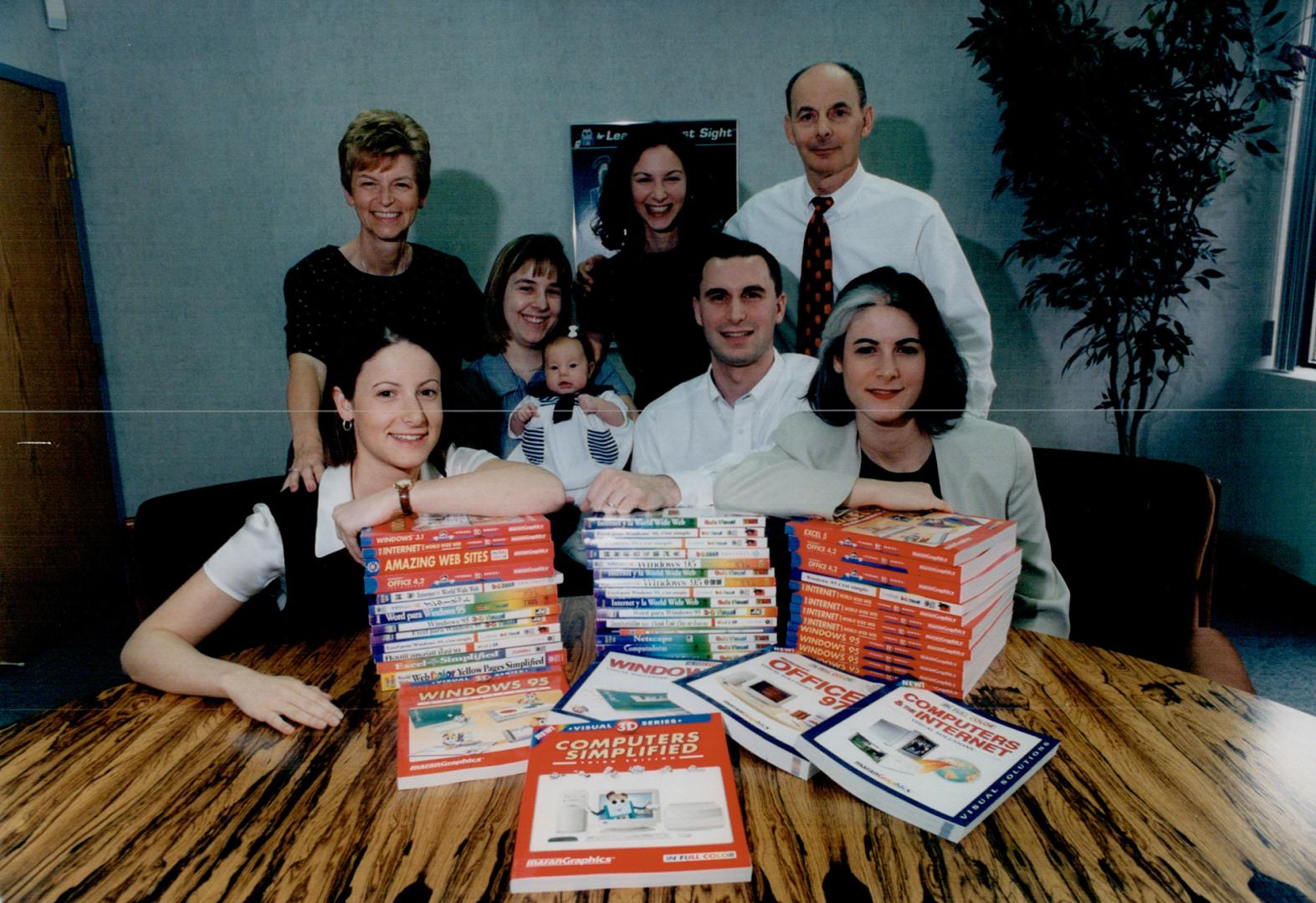 All in the family: The Maran family, back row, left to right, Maxine, Jill and Richard, and seated, Judy Sherry, Rob and Ruth, with baby Annie Rae.