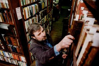 Below, David Mason owner of his store of the same name at 342 Queen St. W.