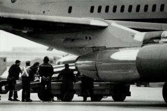 Going home: A casket carrying the body of U