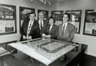 Plotting Future: Vice-president Stephan Thomas, left, Saul and Marllyn Merrick and son Steven Merrick, build 200 to 250 high-end homes yearly in Metro