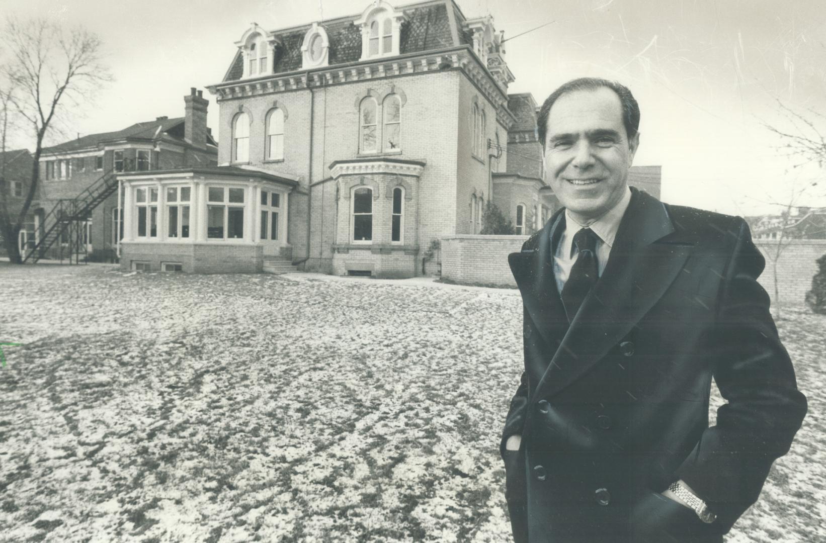 Italian Consul-General Guido Nicosia outside newly-renovated Italian consulate building