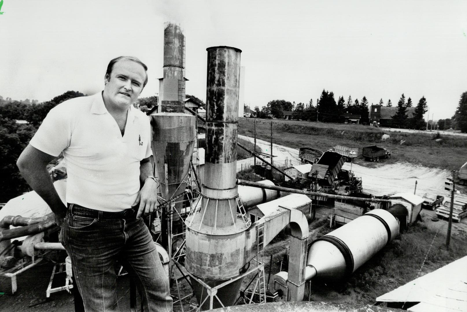 Producing pellets: Kevin Maynard, grandson of the innovator Cecil Maynard, is today's president of the Schomberg Alfalfa Mill shown in background