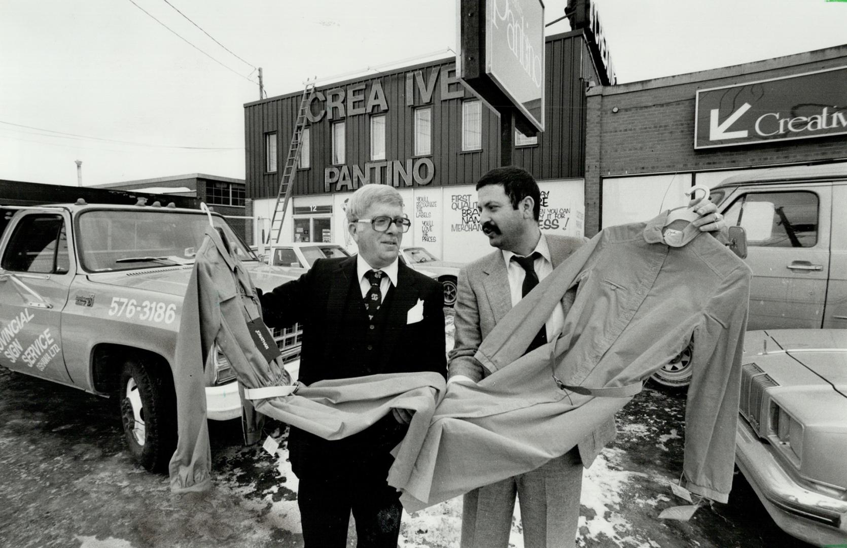 David vs. Goliath: Sam Meister (left) and son Bob examine dress in front of their Creative Pantino clothing store. Discounters face opposition from big suppliers who oppose price-cutting and have taken big firms to court on the issue.