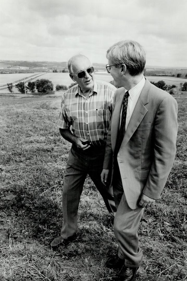 Gordon Mills: The rookie MP, conferring with NDP leader Bob Rae (right) during the provincial election campaign, strongly supports recycling.