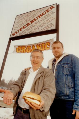 Acting natural: Organic beef is a hit at his restaurant in Primrose, says James Nicolau, left. The meat comes from Carl and Susie Cosack's ranch.