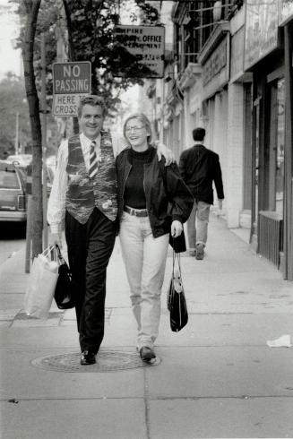 On her way: Budding model Brandy Kusmack goes shopping with agent Elmer Olsen. Below, she's ready for the camera.