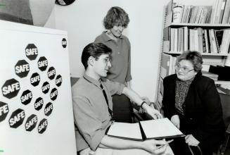 Dino Paoletti (left) of Scarborough AIDS support group with Yvonne Bergmans (centre) Karen Evanshen (right)