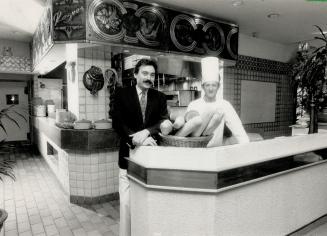 Open kitchen: Owner Tony Pereira and owner-chef. Carlos Perfetti in their Mississauga restaurant.