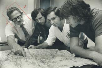 Foursome plan next year's Canoe trip to Quetico park, Peter Priestman, left, Bruce MacDonald, Peter Dallas and John Downie.