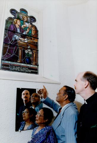 Tribute To The Living: Solomon Rajanayagam looks at a stained-glass window, installed in his honor, with his wife, Rosalind, and Rev