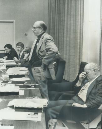 Asking a Question, Newcastle Mayor Garnet Rickard stands yesterday at a meeting of the Durham Regional Council with provincial Treasurer Darcy McKeough