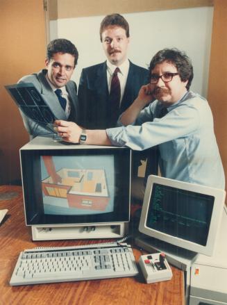 Creative team: Ian Robertson, centre, head of I.S.G. Technologies, with marketing vice-president Henry Vehovec, left, and professor John Stevents.