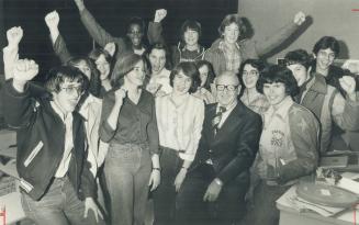 Delighted Etobicoke Collegiate Institute students cheer Vern Rout after hearing he's been named teacher of the year.