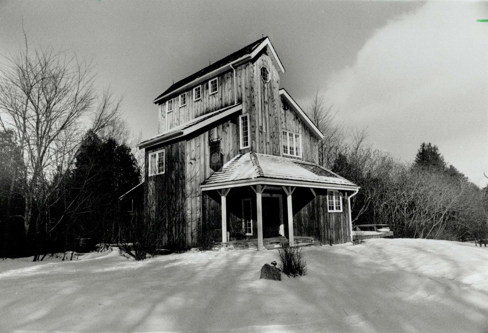 High on a hill: Conventional electricity is only used for light bulbs, stereo, television and appliances in this 65-foot tall, 3,000 square feet home