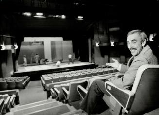 Jim Renshaw, Oshawa Little Theatre's vice-president, proudly surveys layout of new facility